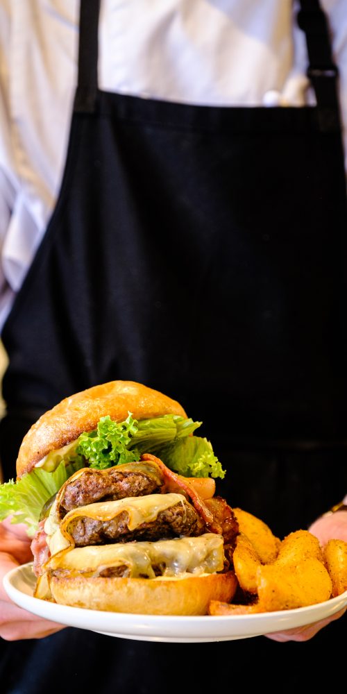 midsection-woman-holding-food